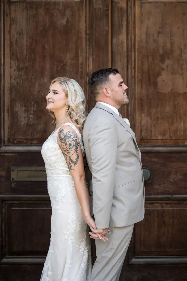 A man and woman standing next to each other.