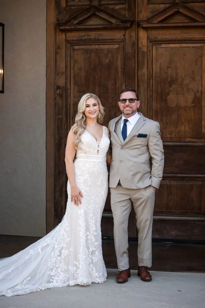 A man and woman posing for a picture.