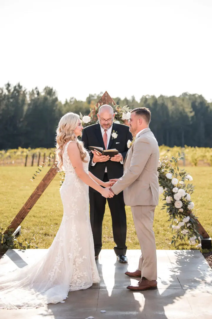 A couple getting married at the ceremony