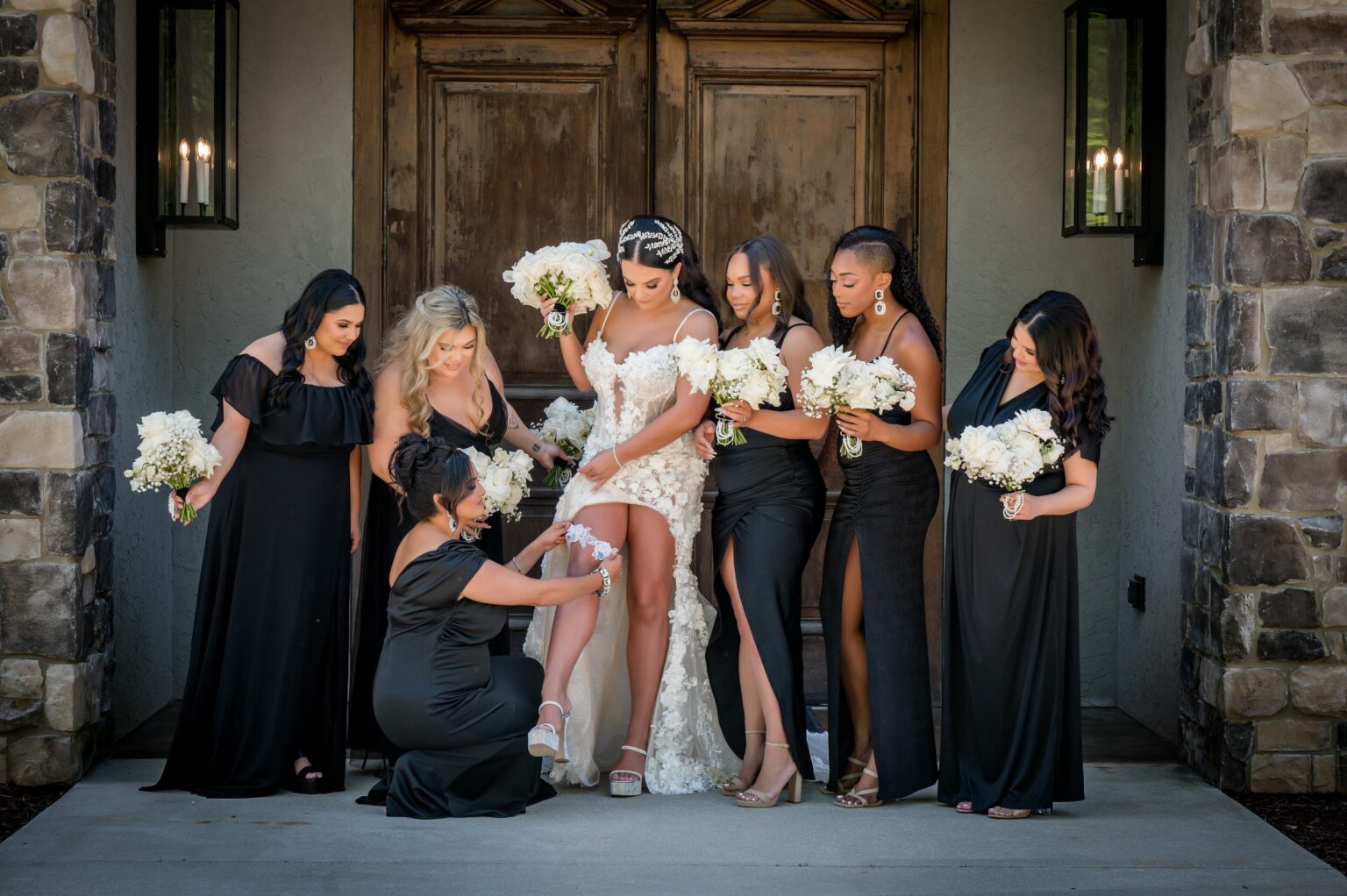 A group of women in black and white dresses.