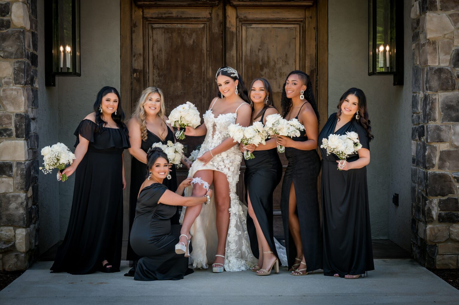 A group of women in black and white dresses.