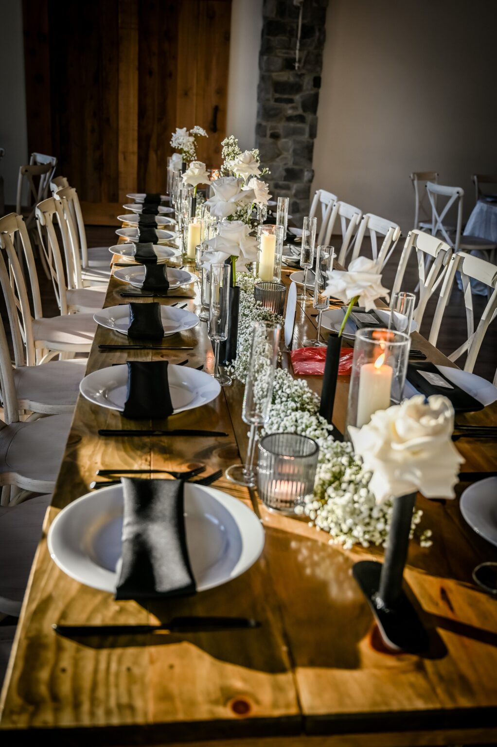 A long table with plates and napkins on it