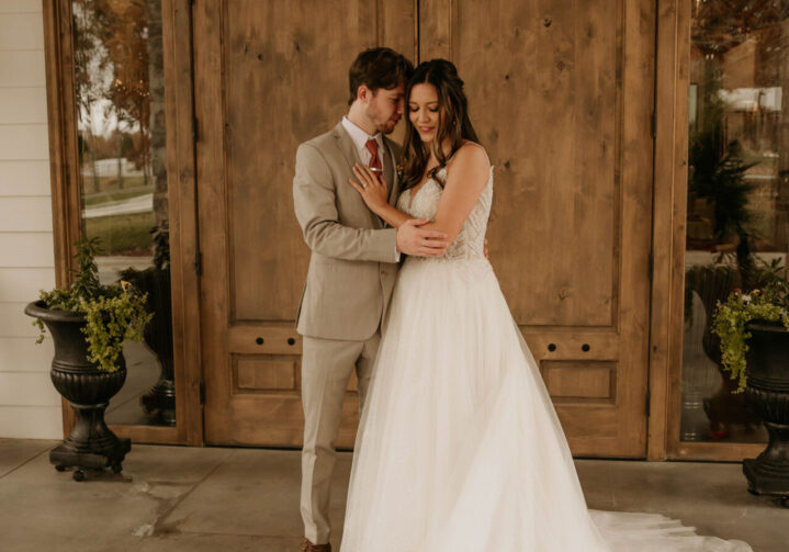 A man and woman posing for a picture.