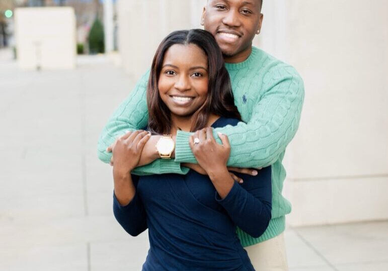 Nichelle and Chris posing together and smiling